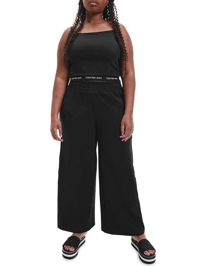 Calvin Klein Jeans Logo Tape Wide Leg Jog Pants In Black 4 Calvin Klein Jeans Logo Tape Wide Leg Jog Pants In Black - Image 2