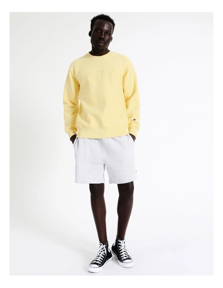 Champion Reverse Weave 2K Logo Crew Fleece In Yellow 3 Champion Reverse Weave 2K Logo Crew Fleece In Yellow