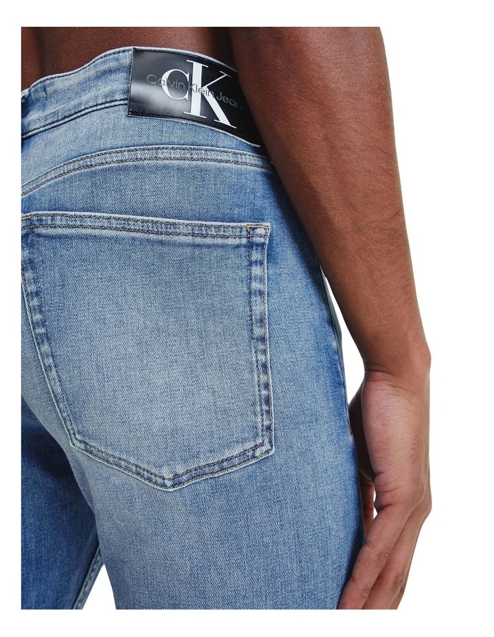 Calvin Klein Jeans Slim Tapered Jeans In Mid Blue 6 Calvin Klein Jeans Slim Tapered Jeans In Mid Blue - Image 4
